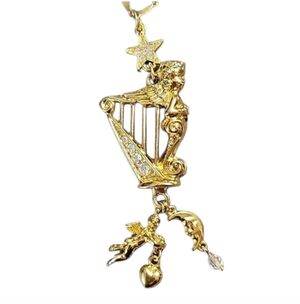Vintage Kirks Folly Angel Harp Goldtone Pendant Necklace